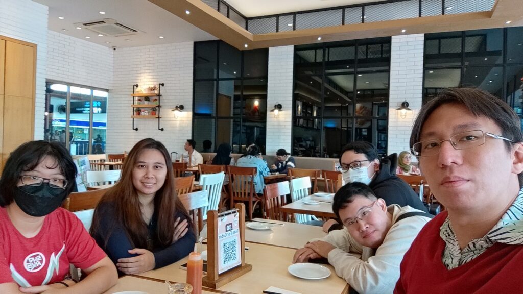 A picture of P, A, H, F, and E (right to left) in a dimsum restaurant.