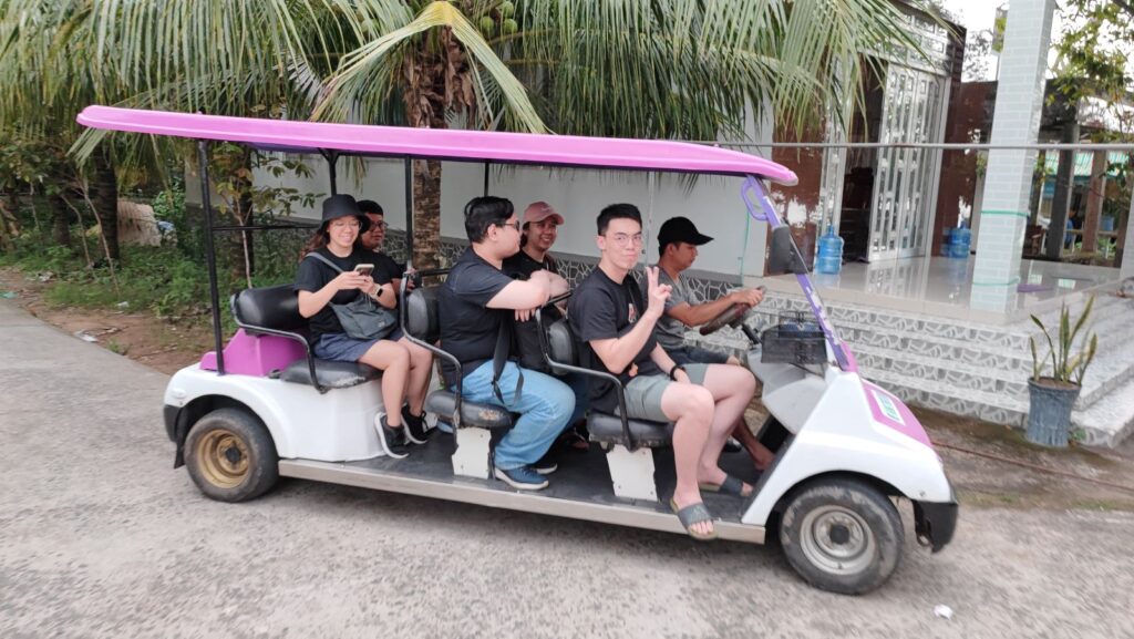 Golf cart with people in it