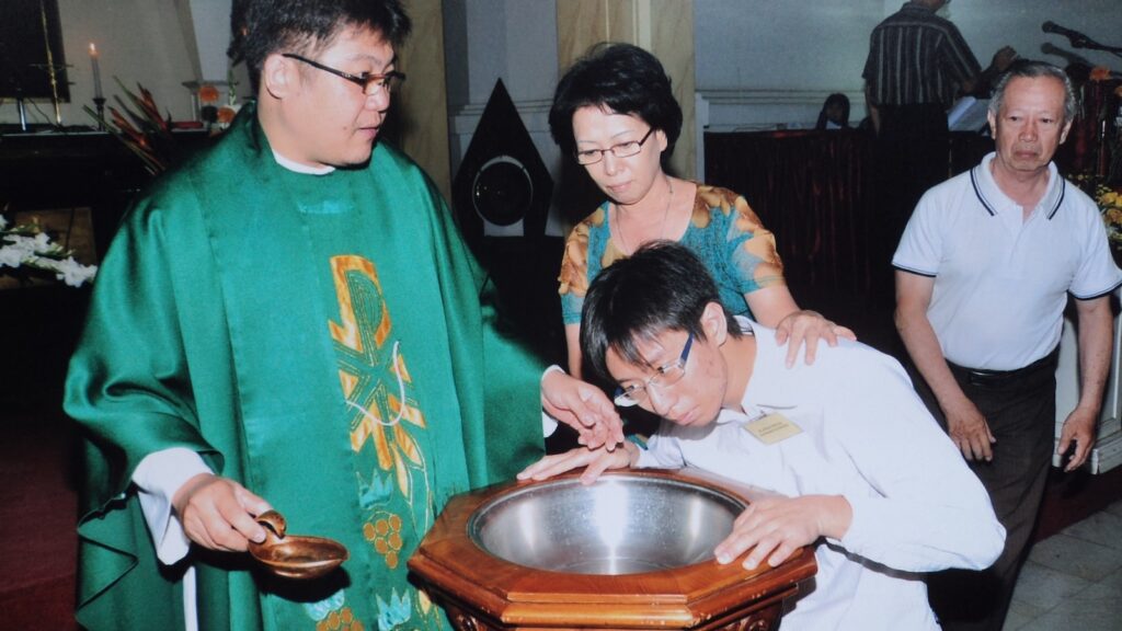 Pascal being baptized.