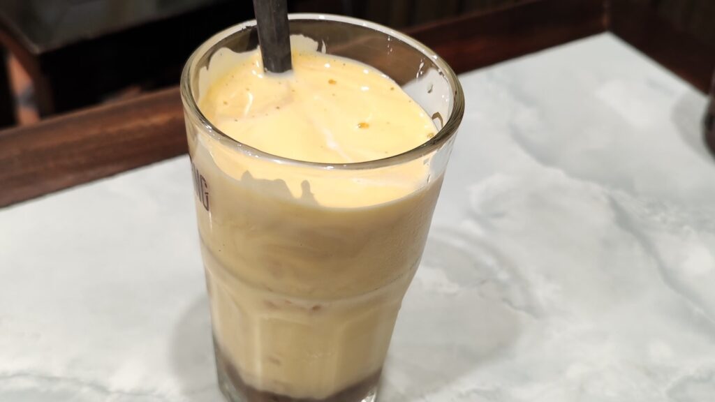 A glass of egg coffee.