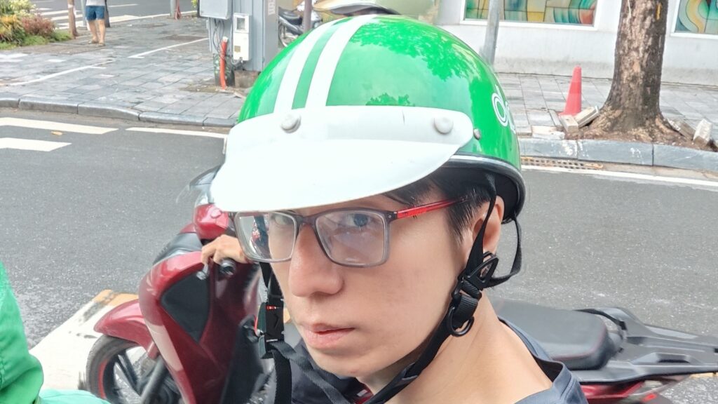 Picture of Pascal wearing Grab helmet.